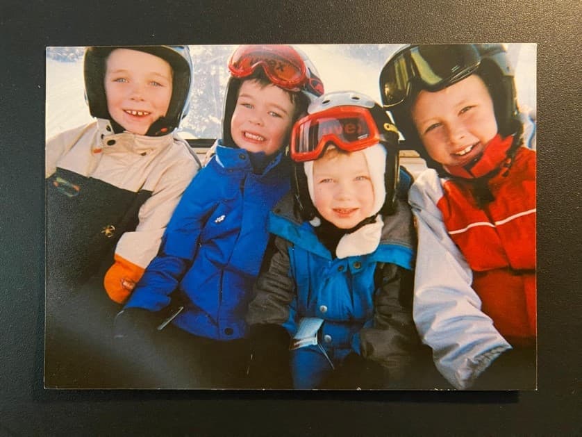 Four Taylor brothers skiing